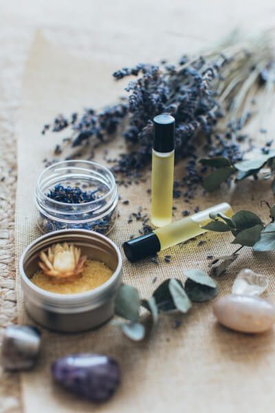 flowers and essential oils on table tao wellness med spa