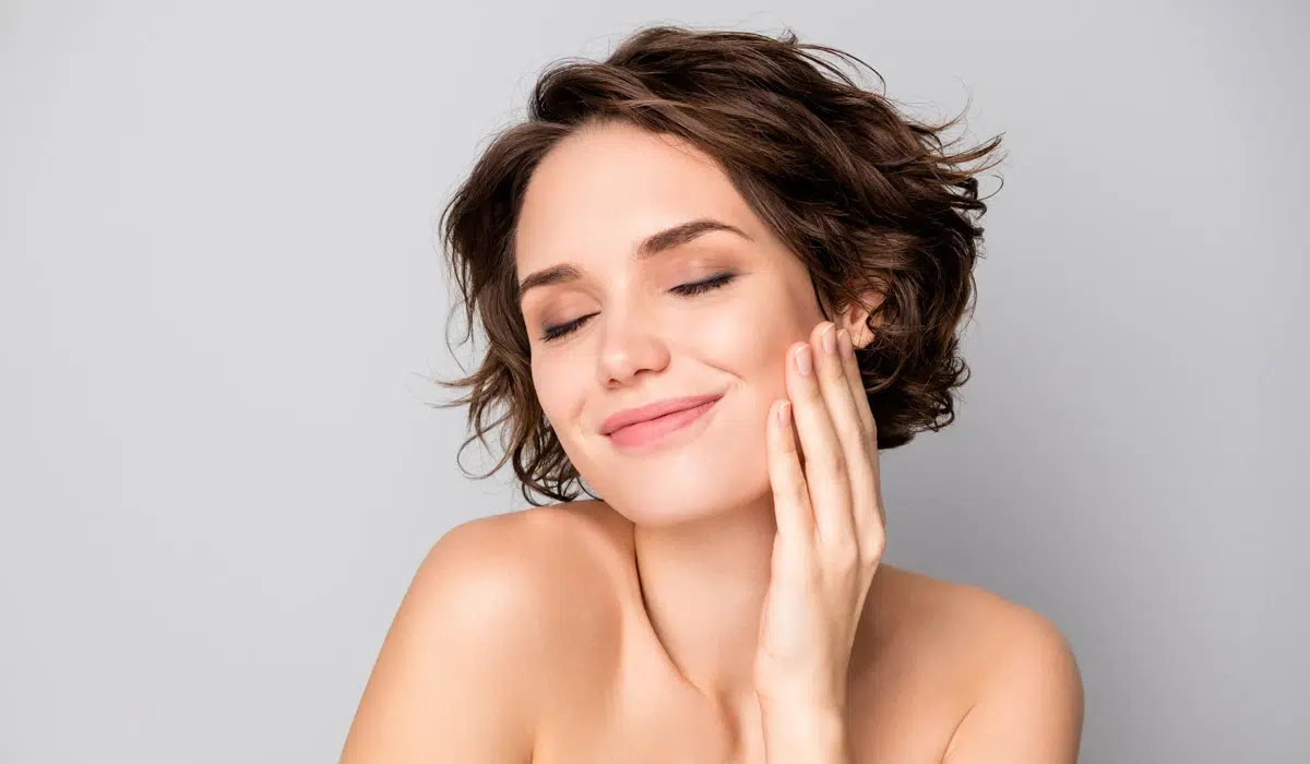 A close-up of a person with a soft, smooth complexion, highlighting the aesthetic benefits of facial rejuvenation procedures.
